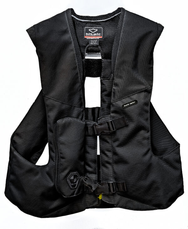 A black vest is shown with the front of it open.