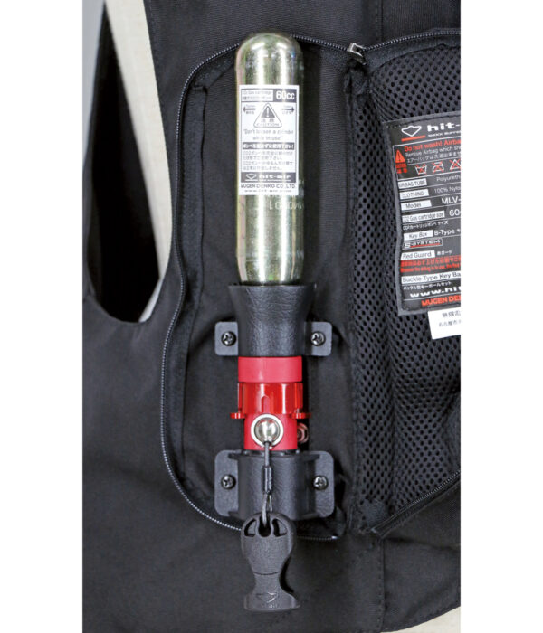 A backpack with a fire extinguisher attached to it.