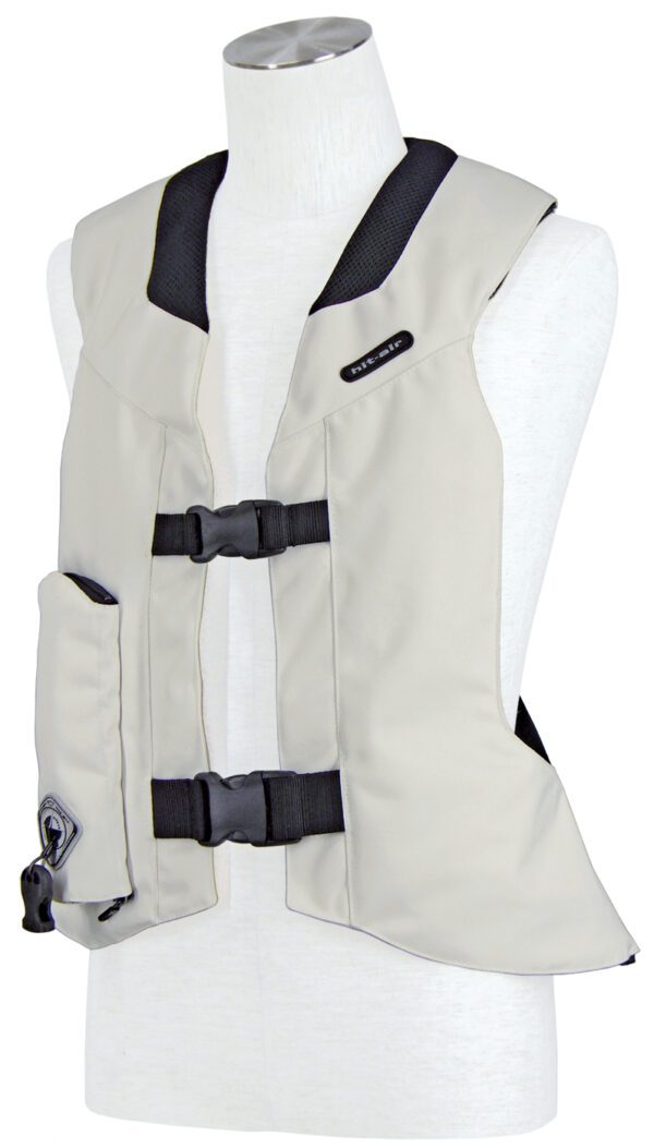 A white vest is shown with black trim.
