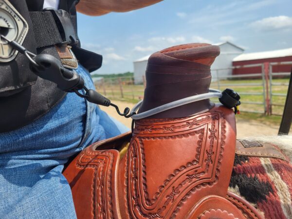 A person wearing cowboy boots and jeans