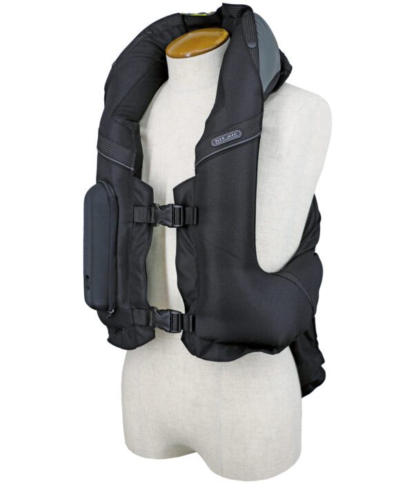 A mannequin wearing an inflatable life jacket.
